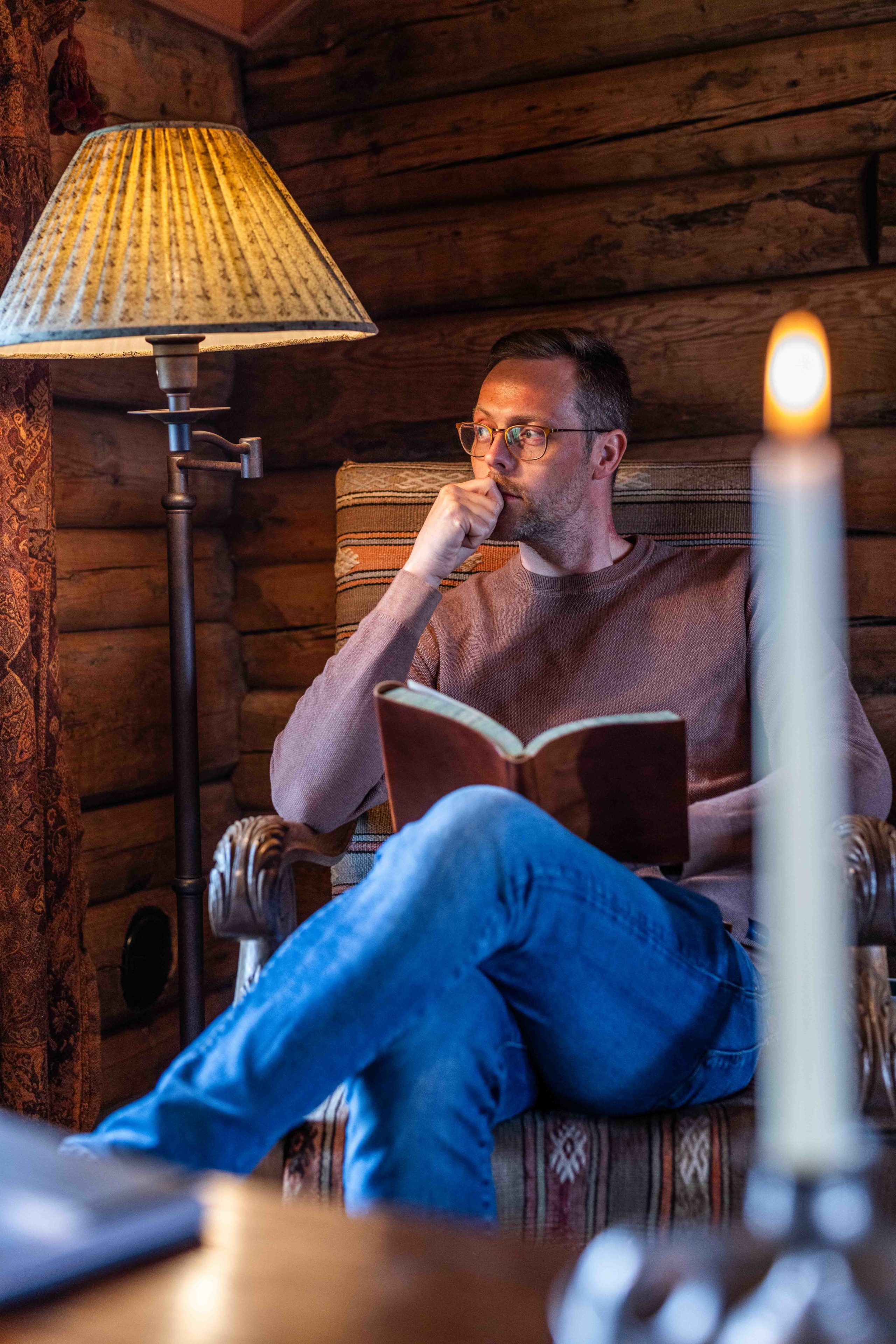 A guest enjoying a quiet moment with a good book